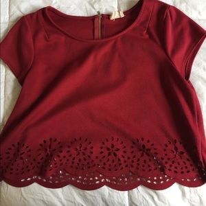Red crop top, flowery eyelets, zip up back